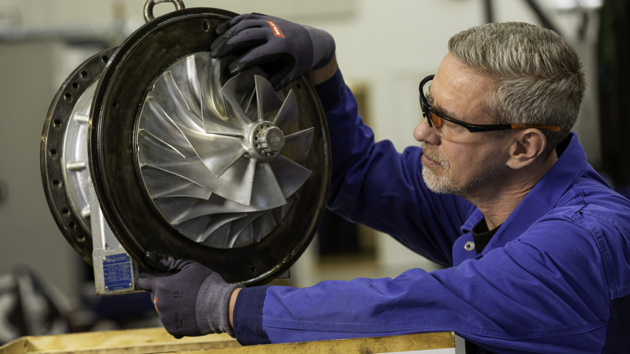 Service engineer putting a turbocharger in a box